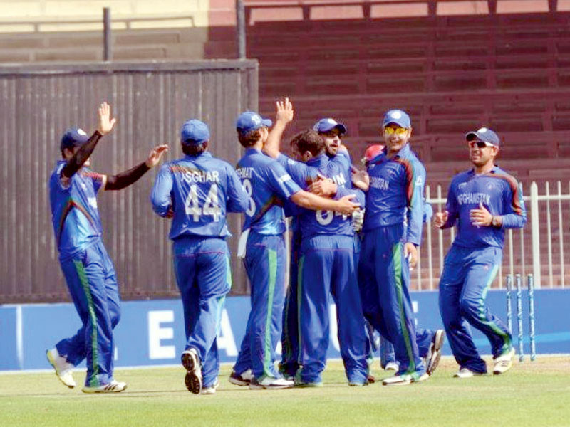 the war torn country afghanistan beat kenya by seven wickets at the sharjah cricket stadium to join ireland as the second associate team for the 2015 world cup photo icc