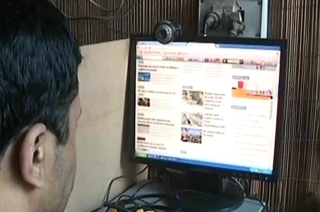 screengrab of internet cafe user browsing the internet