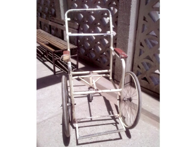 patients have to wait for hours as the hospital is desperately short of wheelchairs photo express