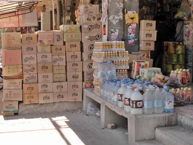 stalls rented out by adjoining shop owners have been set up on the already narrow roads leaving zero space for commuters photo muhammad javaid express stalls rented out by adjoining shop owners have been set up on the already narrow roads leaving zero space for commuters photo muhammad javaid express