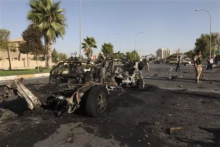 kurdish security forces inspect the site of a bomb attack in the city of arbil photo reuters kurdish security forces inspect the site of a bomb attack in the city of arbil photo reuters
