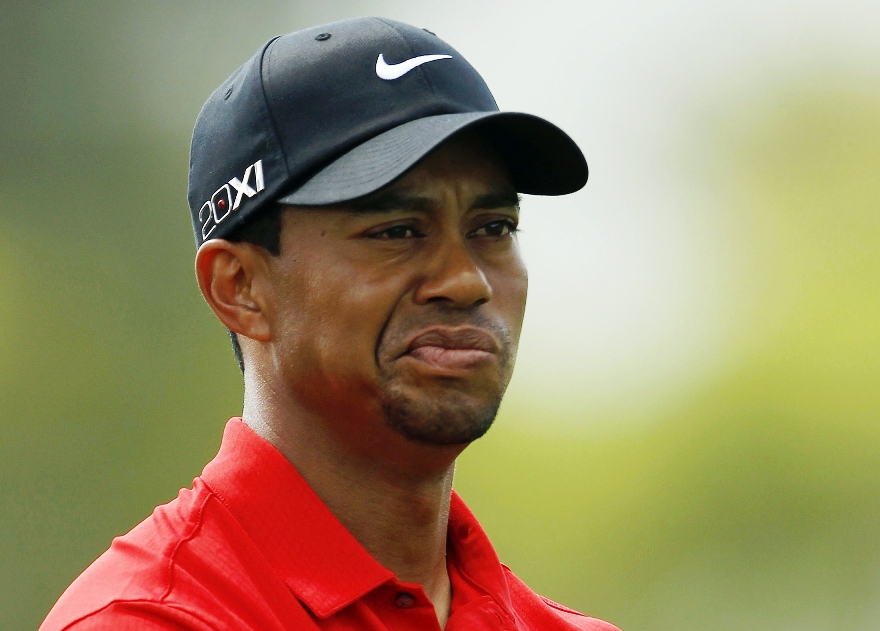 i m a little bit sore and certainly i m looking forward to not touching a club for a while says woods photo reuters file