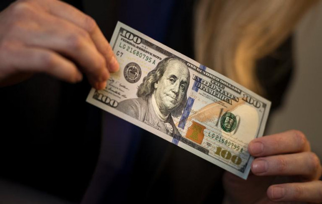the new 100 banknote sports the traditional portrait of american revolutionary war statesman benjamin franklin on the front photo file the new 100 banknote sports the traditional portrait of american revolutionary war statesman benjamin franklin on the front photo file