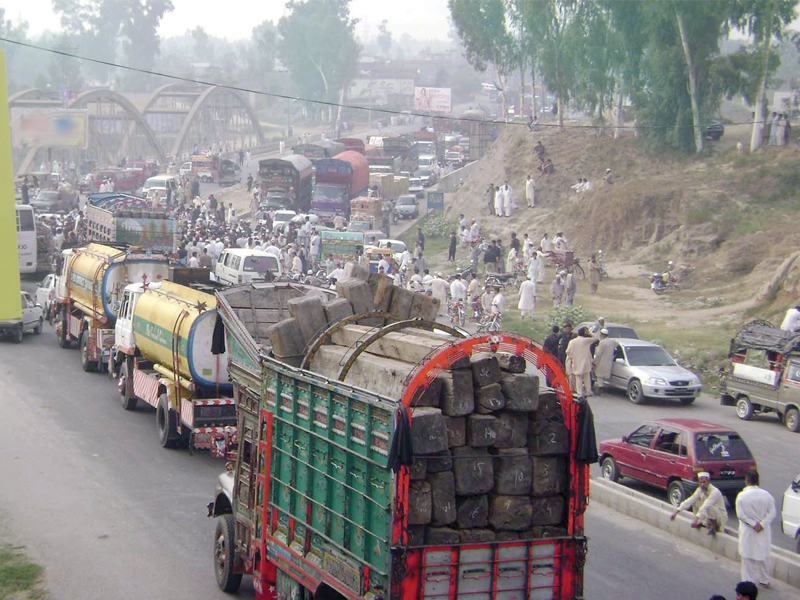 relatives and neighbours of the unfortunate family held a protest and blocked jalala bridge for nearly an hour photo express