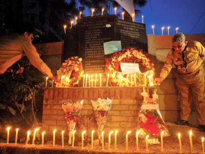 family members friends gather at margalla towers to remember earthquake victims
