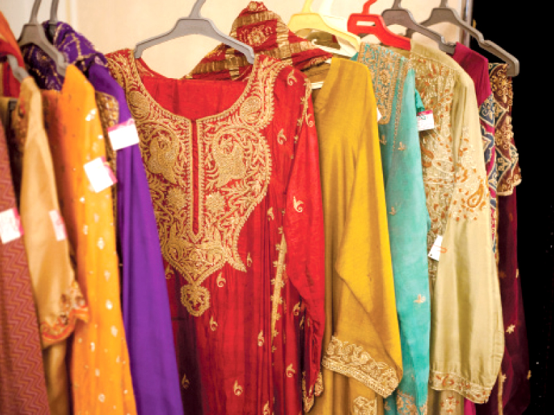 women checking out dresses at the exhibition on wednesday photo myra iqbal express