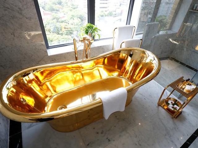 A gold plated bathtub is seen in the newly-inaugurated Dolce Hanoi Golden Lake luxury hotel in Hanoi, Vietnam. PHOTO: REUTERS