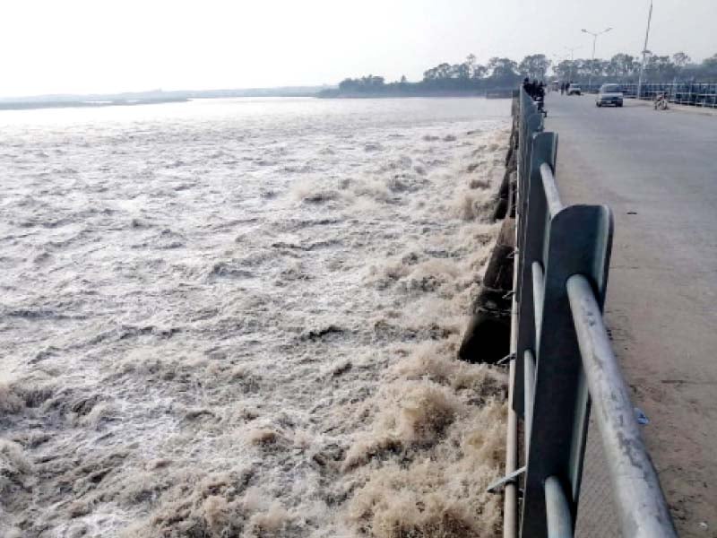 high water level threatens the bridge over the chenab river in sialkot the pdma has issued a red alert to all government agencies and departments to take precautionary measures to avert losses photo ppi