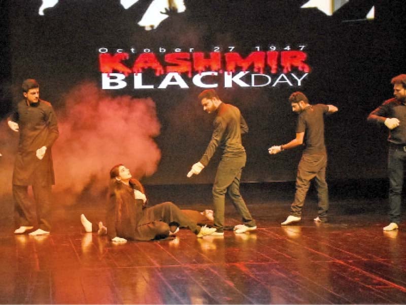 artists perform a play in connection with kashmir black day at the pakistan national council of the arts photo online