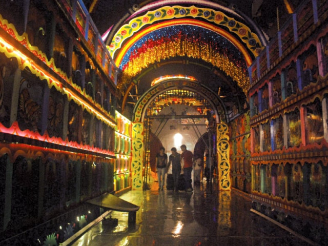 a team of pakistani truck artists have decorated the nabin pally durga puja pandal tucked away in one of the narrow lanes of north kolkata with their phool patti paintings in styles from karachi peshawar and rawalpindi