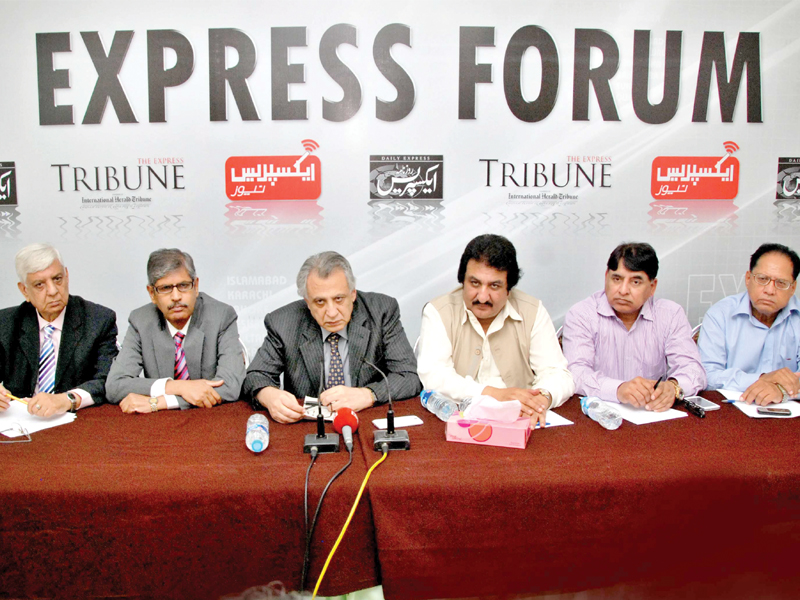 speakers present their views at express forum photo express
