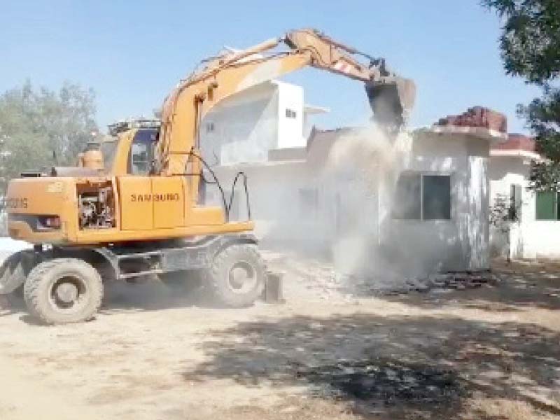 a farmhouse being razed on the first day of a three day anti encroachment drive in malir the move sparked a protest fol lowing which the operation was suspended for the day photo express