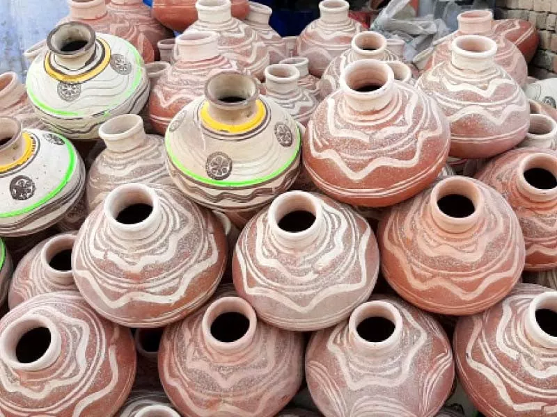 a special type of clay is extracted from the jhelum river bank to make the earthen pots photo express
