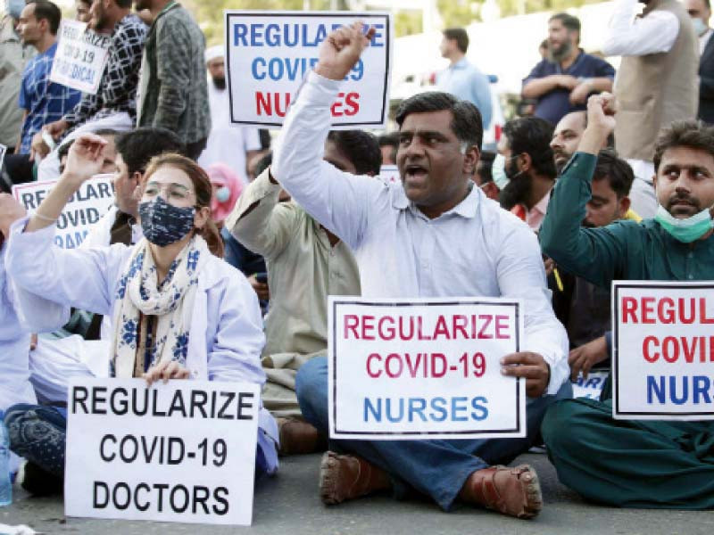 members of young nurses association stage a protest demonstration in favour of their demands near cm house photo ppi