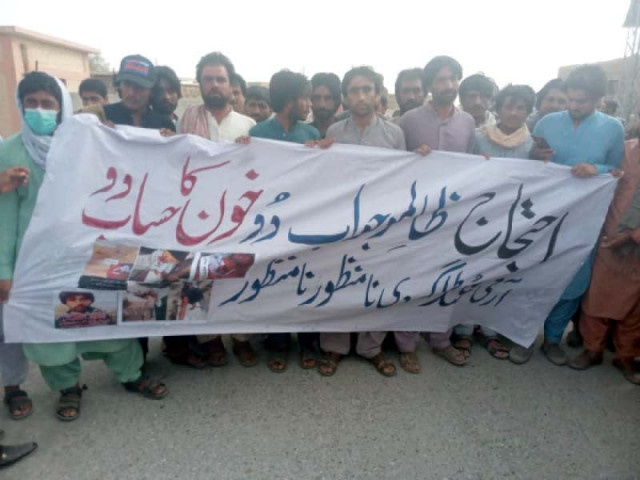 residents of chaghi chant slogans and display banners during a demo protest photo express residents of chaghi chant slogans and display banners during a demo protest photo express