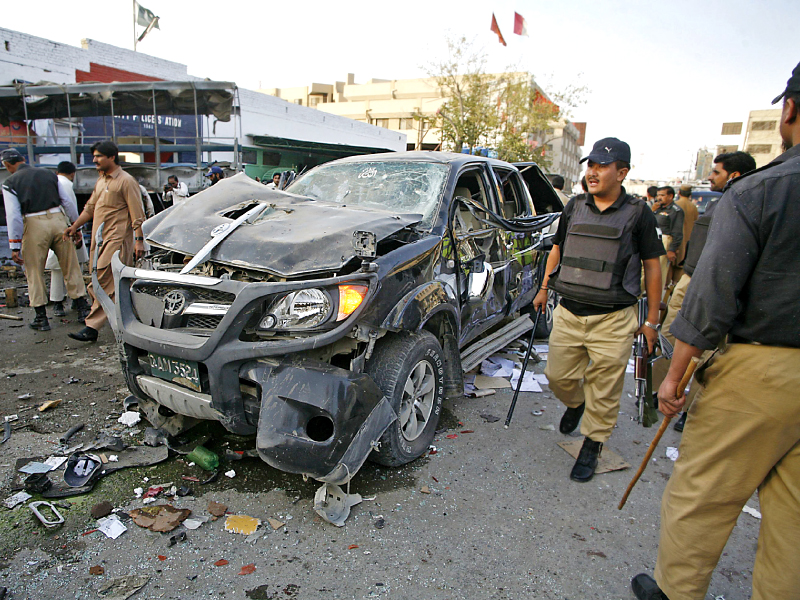 a wrecked vehicle at the site of the bomb blast in quetta s crowded market area photo reuters