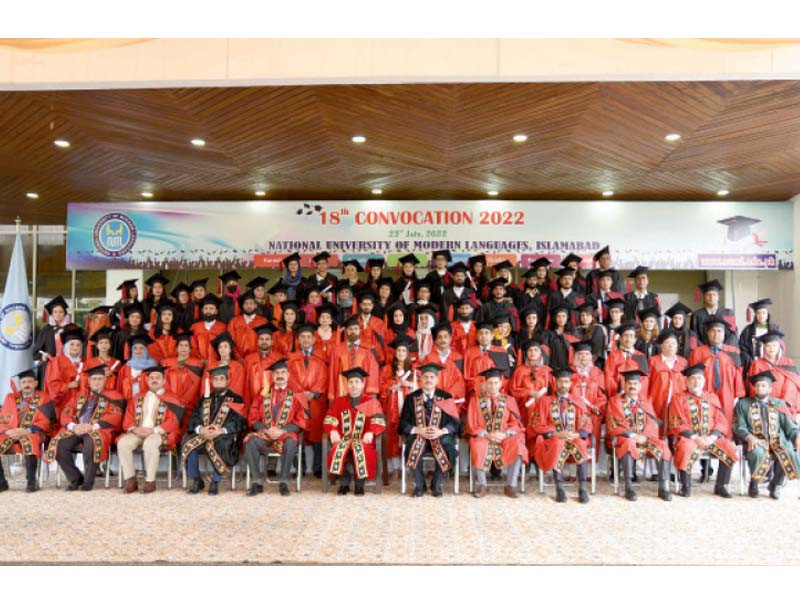 deputy chairman senate mirza muhammad afridi poses for a photo with the graduating cohort of ph d and m phil degree holders university staff and other notable figures at numl s 18th convocation held at the convention centre islamabad photo express