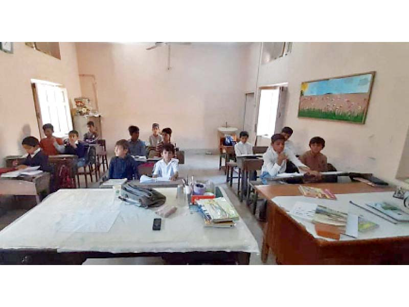 children attend class at a school where one of the buildings was rented out by the contractor photo safdar rizvi express