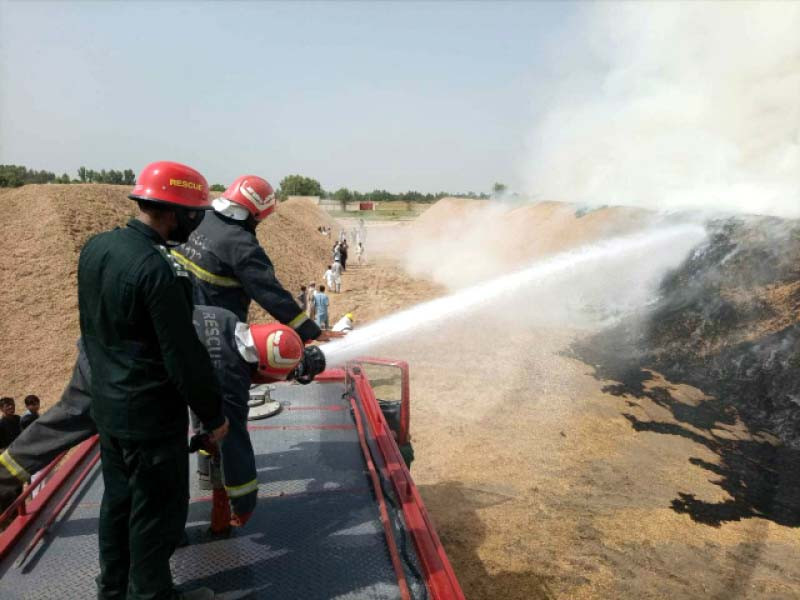 firefighters struggle to put out the raging blaze photo express