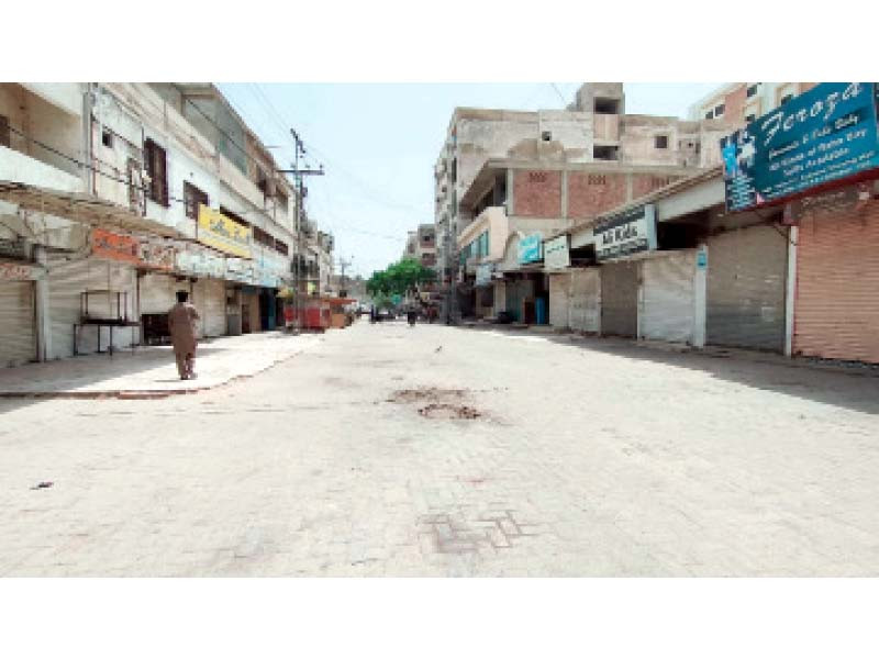 shutters are down at a busy market in the latifabad area of hyderabad during a strike called by hyderabad chamber of commerce and industry against high electricity tariff photo express