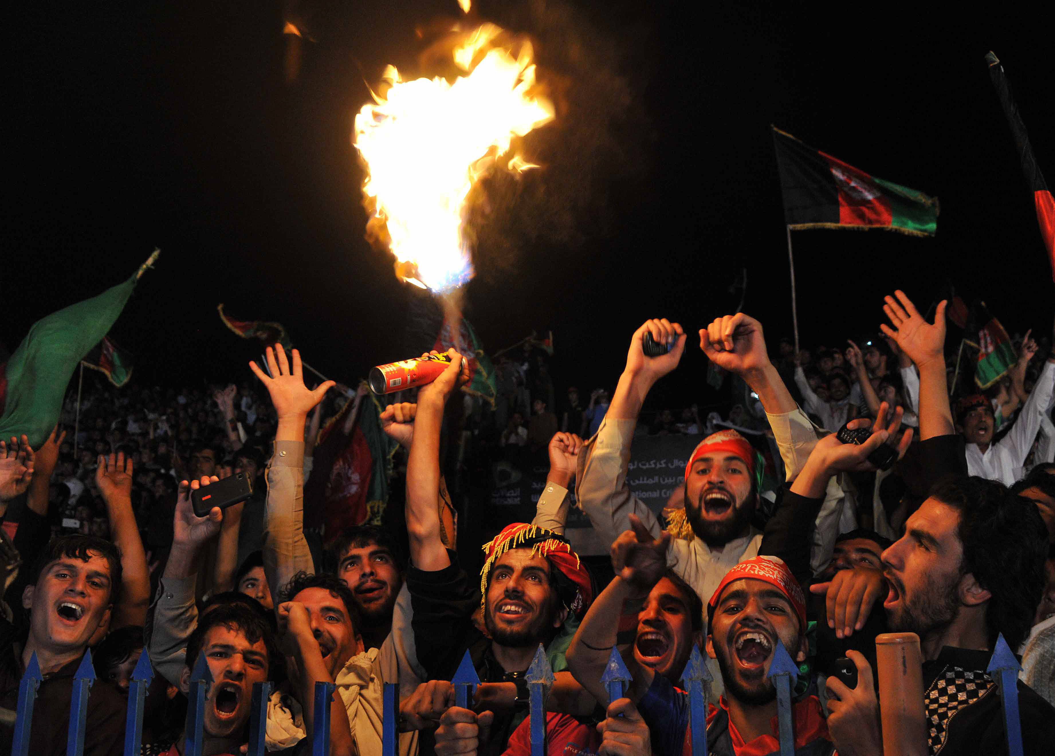 afghan cricket fans welcome home the national team in kabul on october 12 2013 after they qualified for the 2015 world cup photo afp