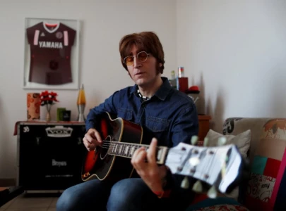 john lennon s rare guitar up for auction