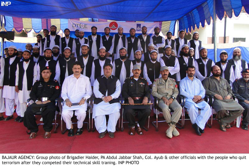brigadier haider political agent bajaur agency jabbar shah and col ayub along with 42 former militants who passed a technical skill rehabilitation course photo inp