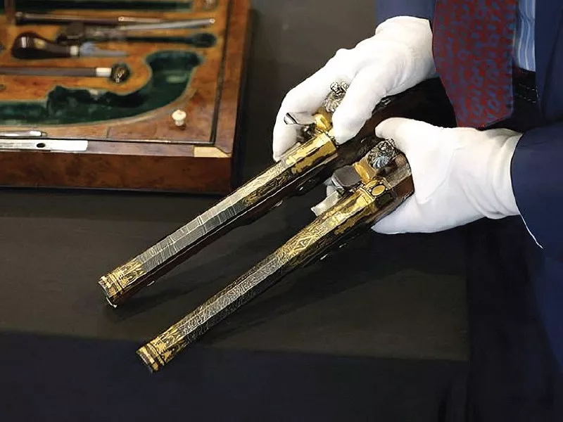 selling above the estimated price the richly decorated guns inlaid with gold and silver feature the engraved image of napoleon in full imperial pomp photo file selling above the estimated price the richly decorated guns inlaid with gold and silver feature the engraved image of napoleon in full imperial pomp photo file