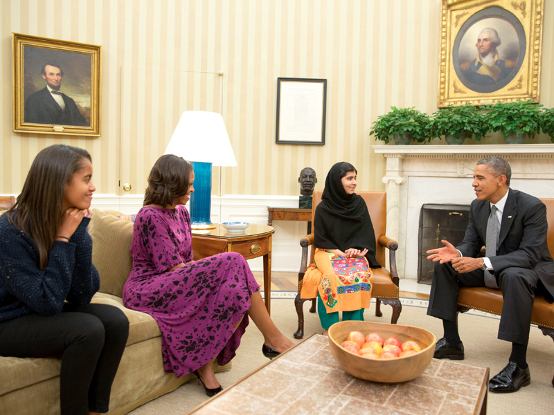 president obama first lady michelle obama and their daughter malia meet malala yousafzai in the oval office photo afp