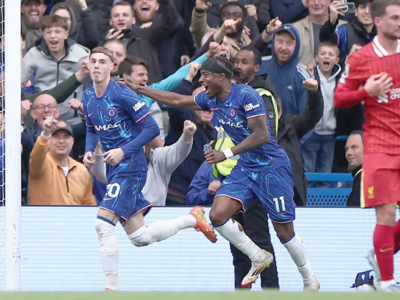 chelsea players celebrate after scoring against liverpool photo afp chelsea players celebrate after scoring against liverpool photo afp