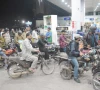 as the city runs on fumes motorcyclists line up at a petrol pump in karachi waiting their turn amid surge in fuel prices photo jalal qureshi express as the city runs on fumes motorcyclists line up at a petrol pump in karachi waiting their turn amid surge in fuel prices photo jalal qureshi express
