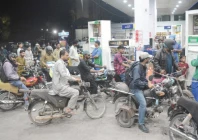 as the city runs on fumes motorcyclists line up at a petrol pump in karachi waiting their turn amid surge in fuel prices photo jalal qureshi express