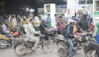 as the city runs on fumes motorcyclists line up at a petrol pump in karachi waiting their turn amid surge in fuel prices photo jalal qureshi express