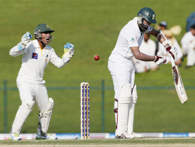 hashim amla r of south africa bats as wicketkeeper adnan akmal reacts photo afp hashim amla r of south africa bats as wicketkeeper adnan akmal reacts photo afp
