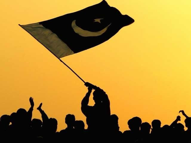 a man waves the flag of pakistan in the air as people watch the ceremony to lower the national flags at the border crossing between pakistan and india march 11 2004 in wagah pakistan photo getty a man waves the flag of pakistan in the air as people watch the ceremony to lower the national flags at the border crossing between pakistan and india march 11 2004 in wagah pakistan photo getty