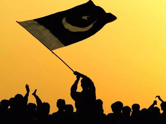 a man waves the flag of pakistan in the air as people watch the ceremony to lower the national flags at the border crossing between pakistan and india march 11 2004 in wagah pakistan photo getty a man waves the flag of pakistan in the air as people watch the ceremony to lower the national flags at the border crossing between pakistan and india march 11 2004 in wagah pakistan photo getty