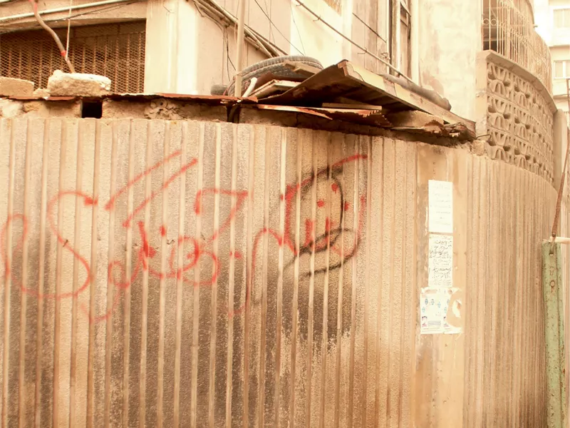 the apartment buildings and the aga khan park just a few metres away from the jamaat khana in garden east are covered with wall chalking such as lashkar e jhangvi zindabad above photo zeenia shaukat the apartment buildings and the aga khan park just a few metres away from the jamaat khana in garden east are covered with wall chalking such as lashkar e jhangvi zindabad above photo zeenia shaukat
