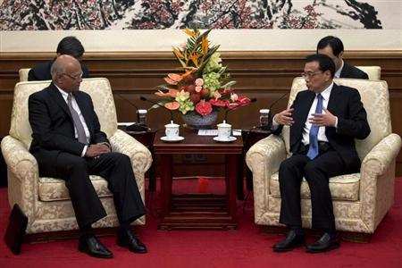 china 039 s premier li keqiang talks to india 039 s national security adviser shivshankar menon front l at diaoyutai state guesthouse in beijing photo reuters