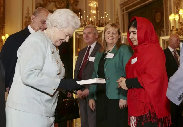 malala yousafzai gives a copy of her book quot i am malala quot to britain 039 s queen elizabeth during a reception for youth education and the commonwealth at buckingham palace in london october 18 2013 photo reuters malala yousafzai gives a copy of her book quot i am malala quot to britain 039 s queen elizabeth during a reception for youth education and the commonwealth at buckingham palace in london october 18 2013 photo reuters