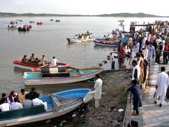 revellers enjoy boating at rawal lake during eid holiday photo muhammad javaid express revellers enjoy boating at rawal lake during eid holiday photo muhammad javaid express