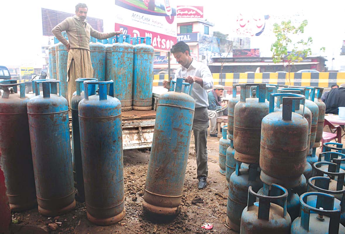 residents protest against district govt for letting gas shops operate in the area photo qazi usman