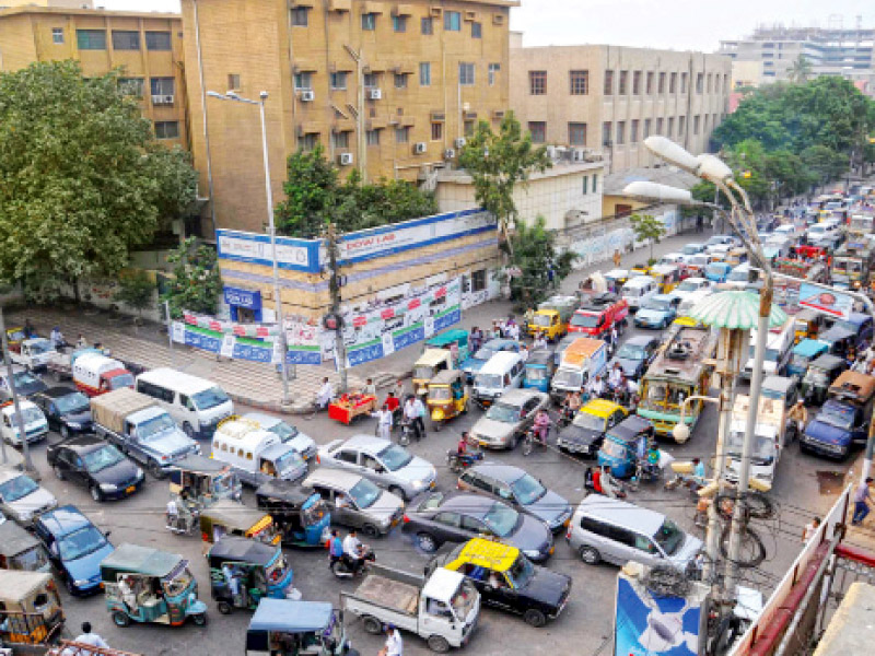 to avoid such massive traffic girdlocks such as the one above on ma jinnah road near civil hospital traffic police aig ghulam qadir thebo suggested redesigning intersections photo file