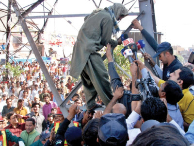 bid for attention man climbs up electric pole to highlight injustice bid for attention man climbs up electric pole to highlight injustice