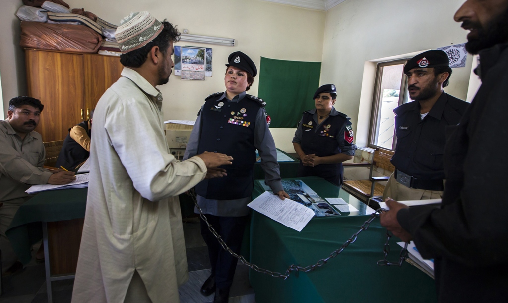 pakistani police inspector shazadi gillani interrogates an accused kidnapper at a police station in abbottabad photo reuters