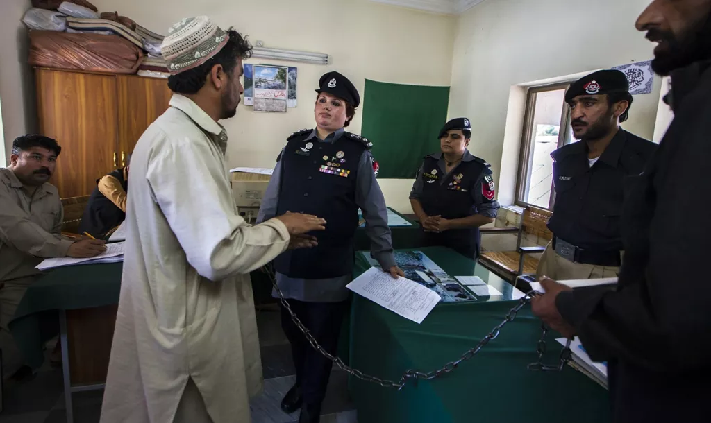 pakistani police inspector shazadi gillani interrogates an accused kidnapper at a police station in abbottabad photo reuters pakistani police inspector shazadi gillani interrogates an accused kidnapper at a police station in abbottabad photo reuters