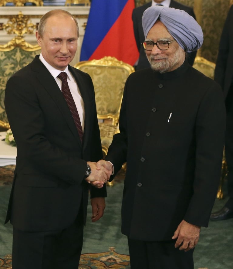 india 039 s prime minister manmohan singh shakes hands with russian president vladimir putin during their meeting in moscow photo reuters