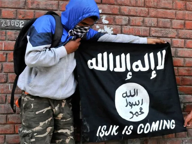 kashmiri protester displaying the flags of isis during a protest against alleged desecration of jamia masjid by police personnel after friday prayers on june 27 2015 in srinagar india photo getty kashmiri protester displaying the flags of isis during a protest against alleged desecration of jamia masjid by police personnel after friday prayers on june 27 2015 in srinagar india photo getty