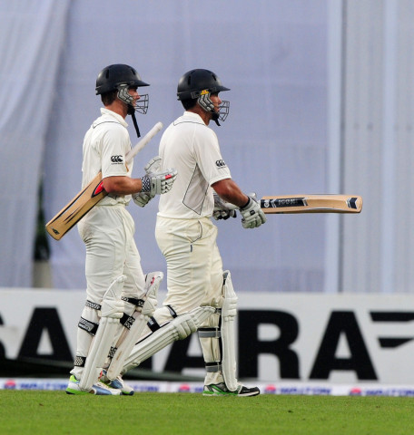 new zealand cricketers ross taylor r and kane williamson leave the field as rain interrupts play during the second day of the second cricket test match between bangladesh and new zealand photo afp new zealand cricketers ross taylor r and kane williamson leave the field as rain interrupts play during the second day of the second cricket test match between bangladesh and new zealand photo afp