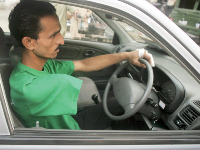 valet ameer nawab strove to overcome his handicap after his right arm was cut off in an accident by working as a driver for valet solutions left a speech and hearing impaired person wears a shirt saying please understand my disability as he guides traffic at a shopping mall right photos ayesha mir amp athar khan express valet ameer nawab strove to overcome his handicap after his right arm was cut off in an accident by working as a driver for valet solutions left a speech and hearing impaired person wears a shirt saying please understand my disability as he guides traffic at a shopping mall right photos ayesha mir amp athar khan express