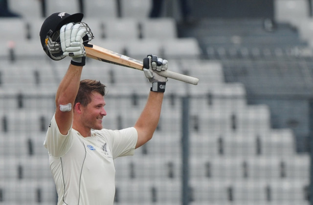 new zealand batsman corey anderson reacts after scoring a century during the third day of the second cricket test match between bangladesh and new zealand at the sher e bangla national stadium in dhaka on october 23 2013 photo afp new zealand batsman corey anderson reacts after scoring a century during the third day of the second cricket test match between bangladesh and new zealand at the sher e bangla national stadium in dhaka on october 23 2013 photo afp